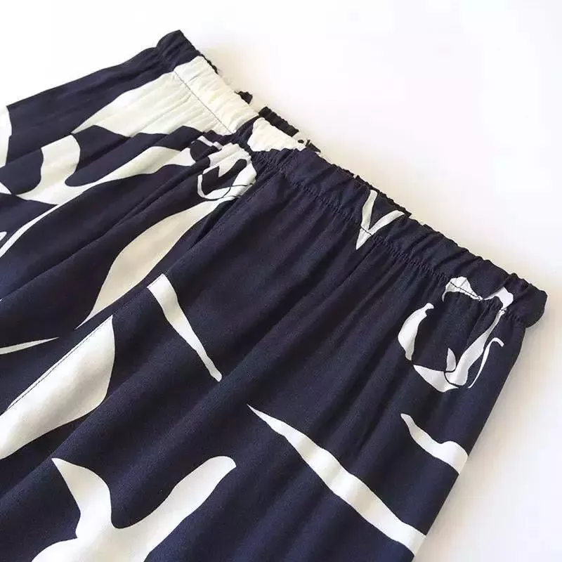Pyjama satin bleu marine et blanc