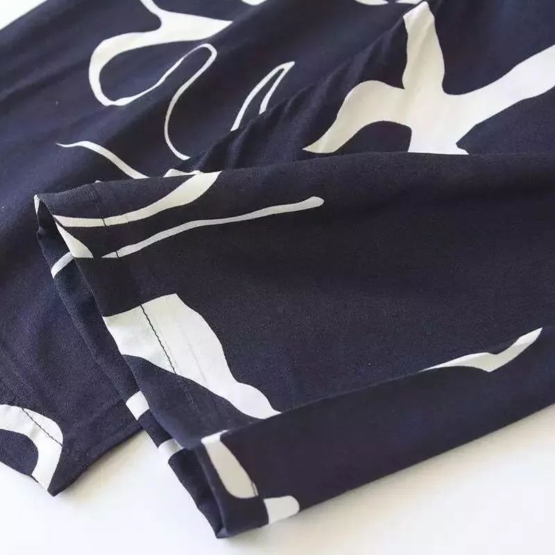 Pyjama satin bleu marine et blanc